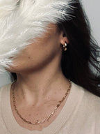 Gloria – Gold Paperclip Necklace from the Timeless Grace collection, an 18k gold-filled 16-inch chain. The delicate links catch the light, reflecting timeless elegance and quiet confidence — a reminder to carry your grace with ease and let your inner glow shine.