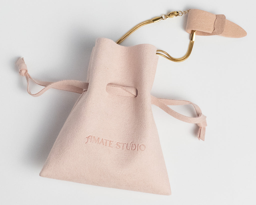 Grace Knot Bracelet gold infinity knot bracelet packaging with branded pouch and tag