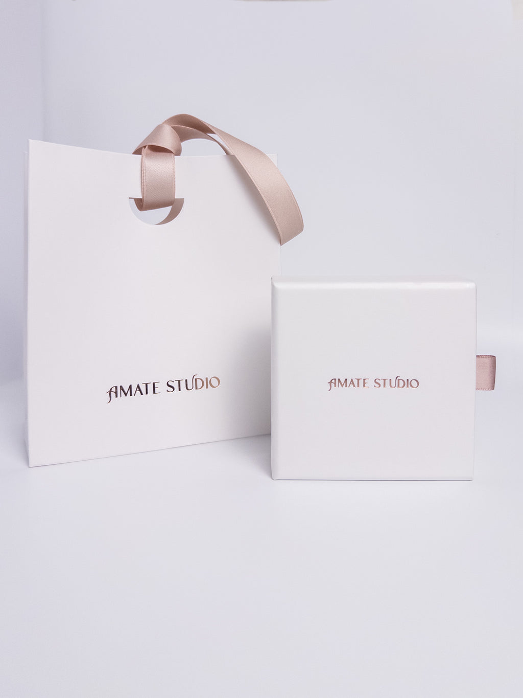 Amate Studio jewelry gift set packaging with drawer box and branded gift bag