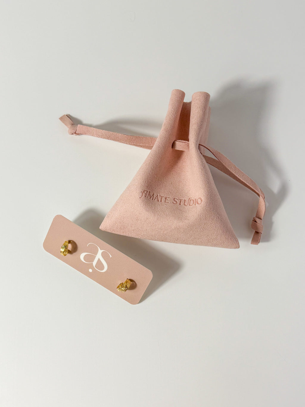 Lucía Hoop double C textured hoop earrings with microfiber pouch and earring card