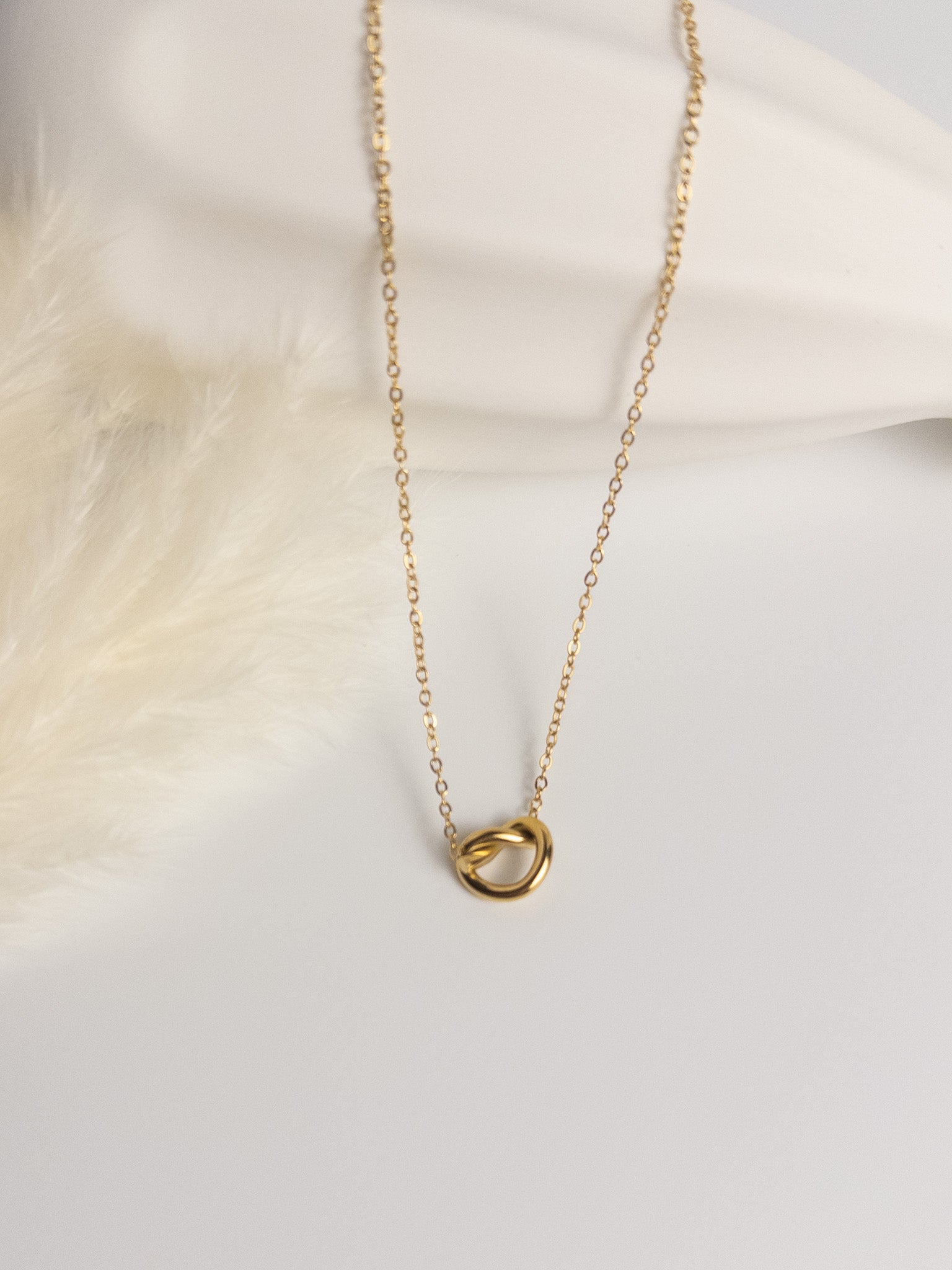 Gold heart knot necklace – Grace Heart Necklace symbolizing love and everyday grace