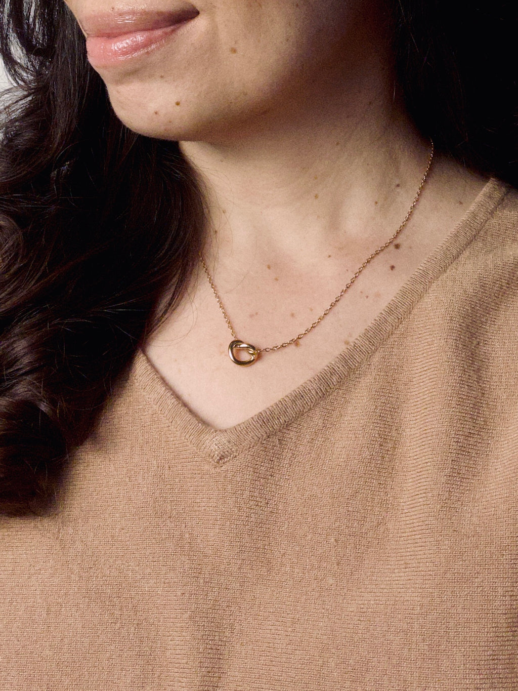 Model wearing Grace Heart gold vermeil necklace featuring a delicate heart pendant, minimalist everyday jewelry.