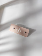 Daily Glow Studs – delicate 0.5mm stainless steel cubic zirconia earrings on blush Amate Studio card, elegant everyday grace look.